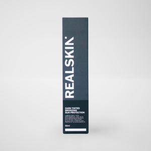 Realskin Sun Protection Dark Tinted Bronzing in a two-tone dark grey rectangle box