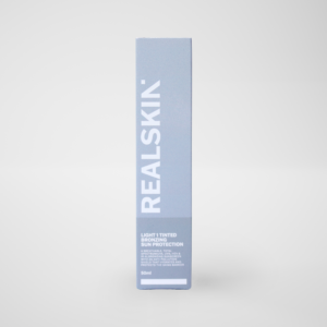 Realskin Sun Protection Light 1 Tinted Bronzing in a two-tone light grey rectangle box