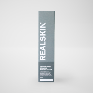 Realskin Sun Protection Medium Tinted Bronzing in a two-tone medium grey rectangle box