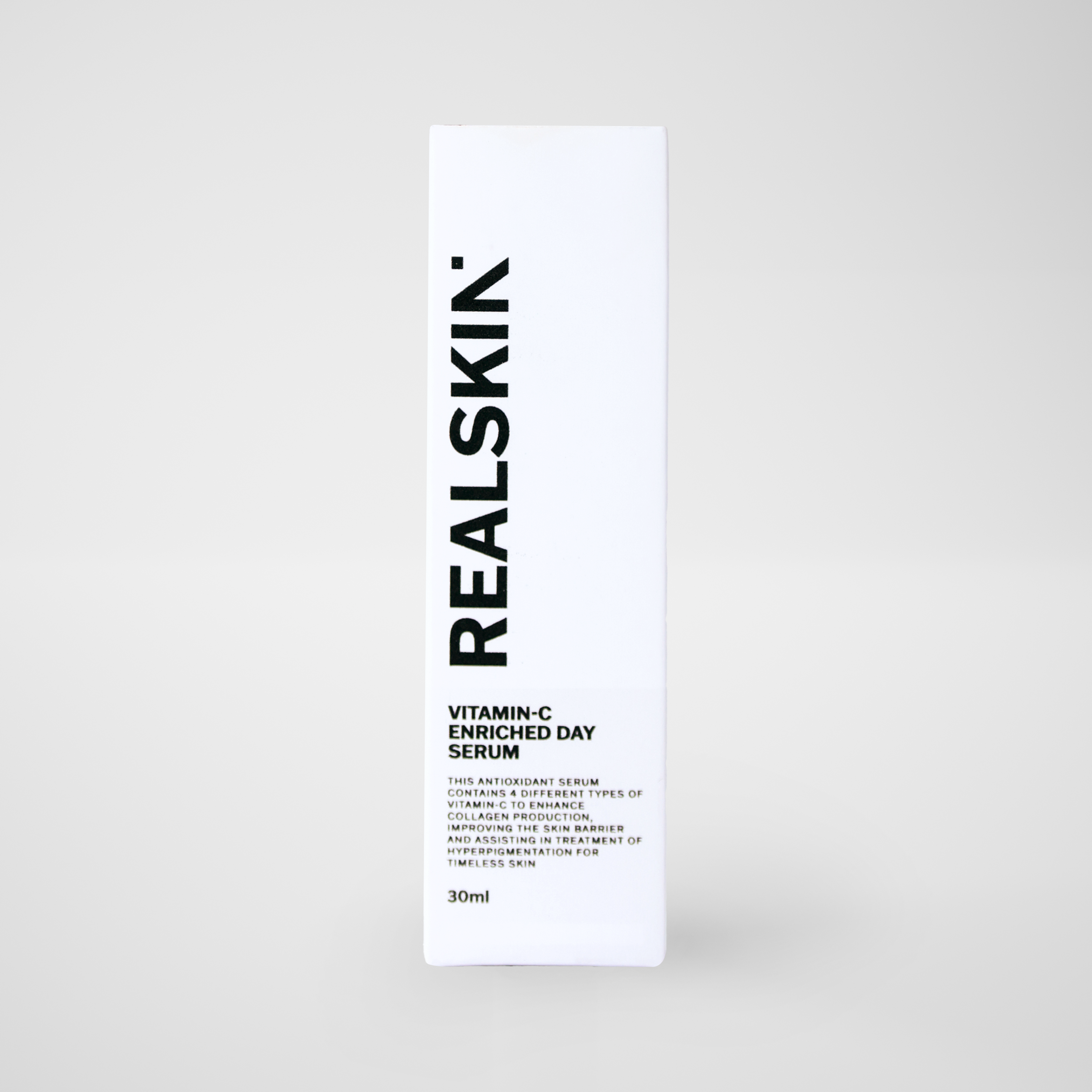 Realskin Vitamin-C Enriched Day Serum in a two-tone turquoise rectangle box